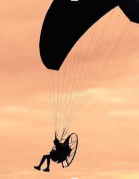 kester haynes flying with paramotor in the evening