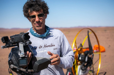 sylvestre campe close up image with camera and paramotor